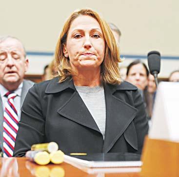 BUSINESS 32 Mylan CEO Heather Bresch pauses as she prepares to testify on Capitol Hill in Washington on Sept 21, before the House Oversight Committee hearing on EpiPen price increases.