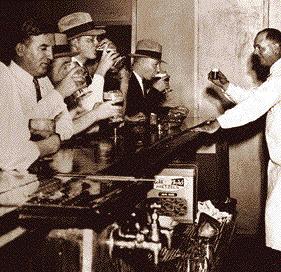 AMENDMENT 18: PROHIBITION - 1919 Men drink at a Speakeasy The manufacturing,