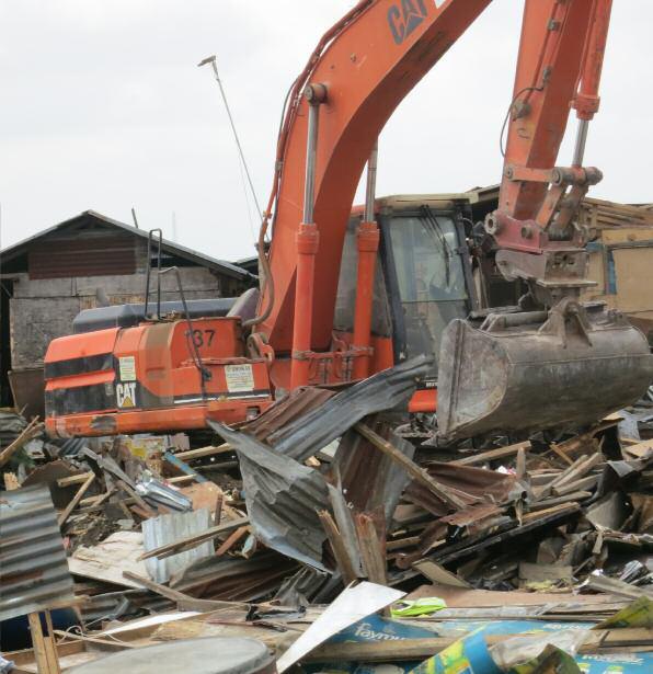 4 Social and Economic Rights Action Centre (SERAC) A bulldozer demolishing homes in Badia East.