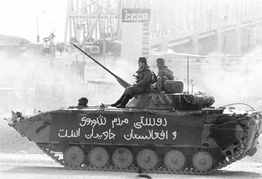 48 CIVIL WAR A Soviet tank crosses the Friendship Bridge linking the USSR and Afghanistan over the Amu Daria River. (Reuters NewMedia Inc.