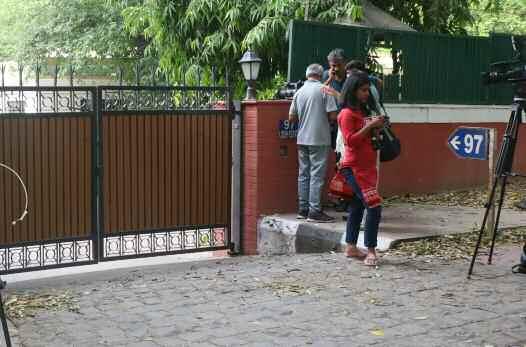 Media personnel outside Congress MP Shashi Tharoor's residence in New Delhi. "They are charging him for abetment of suicide. At least, he has been charged for criminality.