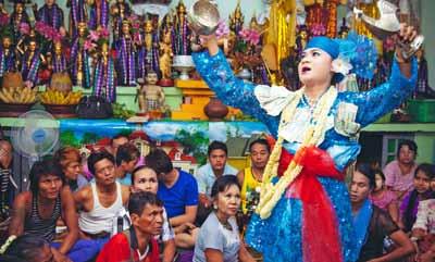 A woman excitedly told me that the nat kadaw we were seeing approach the stage pursued by a woman carrying an offering of roast chicken was her favourite, and she makes sure to catch the performance