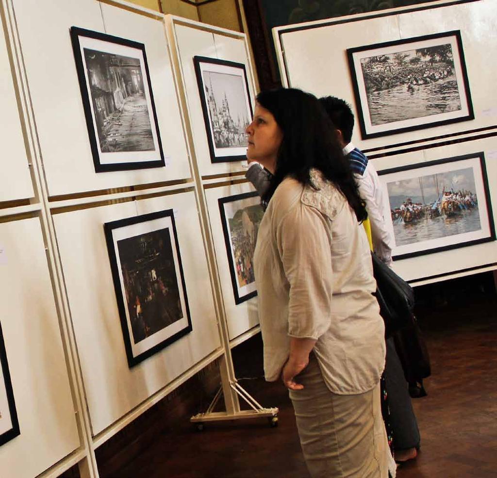 www.mmtimes.com the pulse 41 Photographs, from 100 years apart, are attracting large crowds at the National Theater in Yangon.