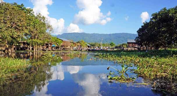 www.mmtimes.com the pulse 45 Indelible Indawgyi Surrounded by scenic mountains and still pristine water, Myanmar s largest lake is easy to fall in love with A view of Hepa village from the lake.