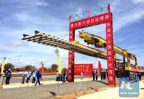 Xinhua China Roads and Bridges Corporation demonstrates new technology for laying track at the standard gauge railway project in Kenya, Oct. 29, 2015.