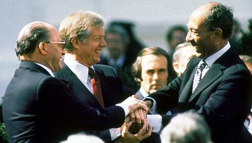 U.S. President Jimmy Carter (center), Israeli Prime Minister Menachem Begin (left), and Egyptian President Anwar el-sadat