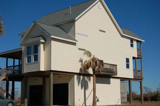 In contrast, a West End vacation home sits well above the surge level, a block off the gulf