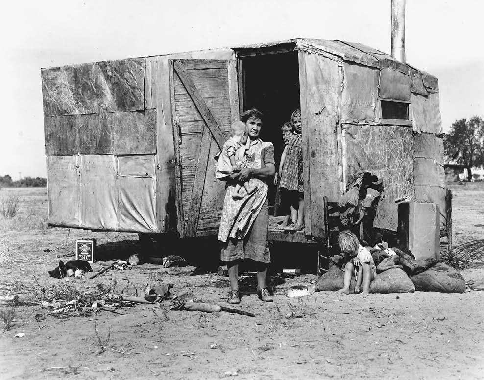 A Texas family of migrant agricultural laborers lived in this trailer south of Chandler, Arizona, in 1940 during the cotton picking season.