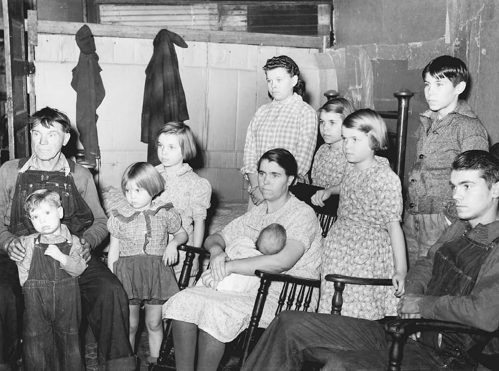 Like many families during the Depression, this unemployed miner from Zeigler, Illinois, depended on government relief to support his wife and nine children in 1939.