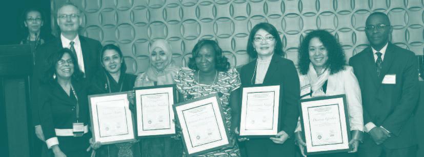The award winners (holding certificates, from left): Nasima Akhter of Bangladesh; Huda Omer Basaleem of Yemen; Adediwura Fred-Jaiyesimi of Nigeria; Namjil Erdenechimeg of Mongolia; and Dionicia