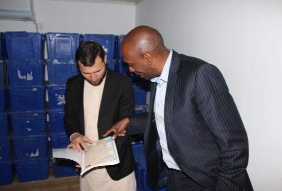 IEC CEO Ziaulhaq Amarkhil and ELECT II CTA Deryck Fritz inspecting the