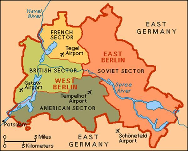 military spending 1961 Russians build the Berlin Wall, separating East (commie) and