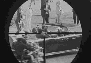 JFK SHOT TO DEATH As the motorcade approached the Texas Book Depository, shots rang out JFK was shot in the neck and then the