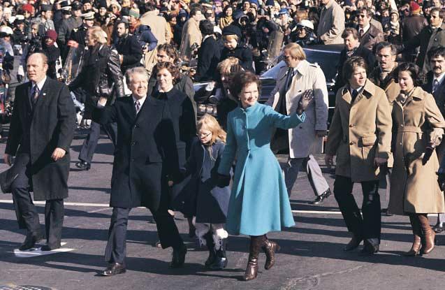 Carter s Inauguration Instead of wearing formal attire to his inauguration, President Jimmy Carter wore a business suit. His wife Rosalynn also chose a more low-key approach to the event.