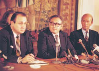 Henry Kissinger (center) played a key role in U.S. negotiations with foreign governments. Analyzing Primary Sources Identifying Points of View Why did this American support Nixon s policy?