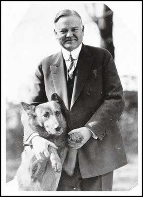 Hoover President Herbert Hoover poses with his dog, King Tut. Hoover is American success story. Against foreign entanglements. Believed in isolationism. Had never run for or held office before.