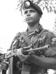 JESS HUNTER A Colombian Armed Forces soldier stands guard in Putumayo province. actions in many parts of the country.