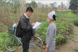 Ngan who is growing clean vegetables on the land where