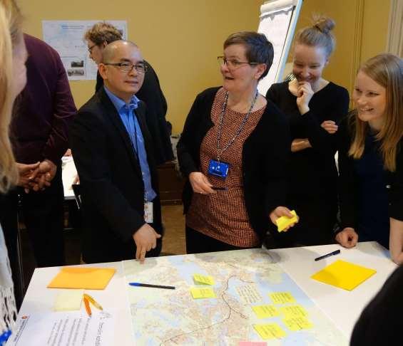Members of the Migrant Council taking part in service model planning, October 2015.