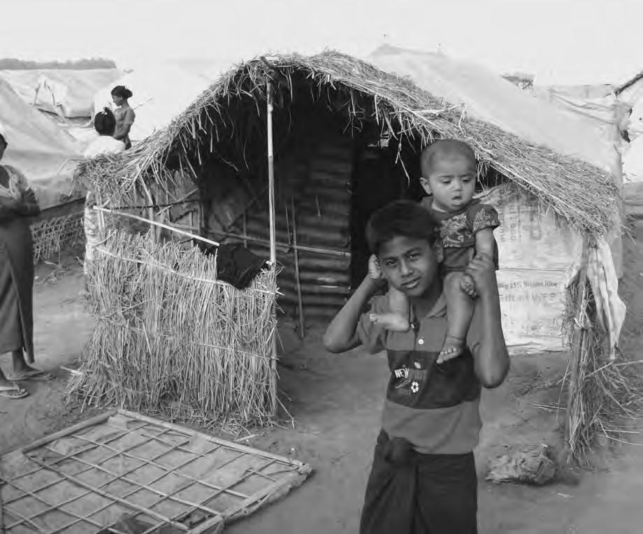Above: Rohingya families living in basic homemade shelters in Rakhine state, Burma. Mathias Eick EU/ECHO.