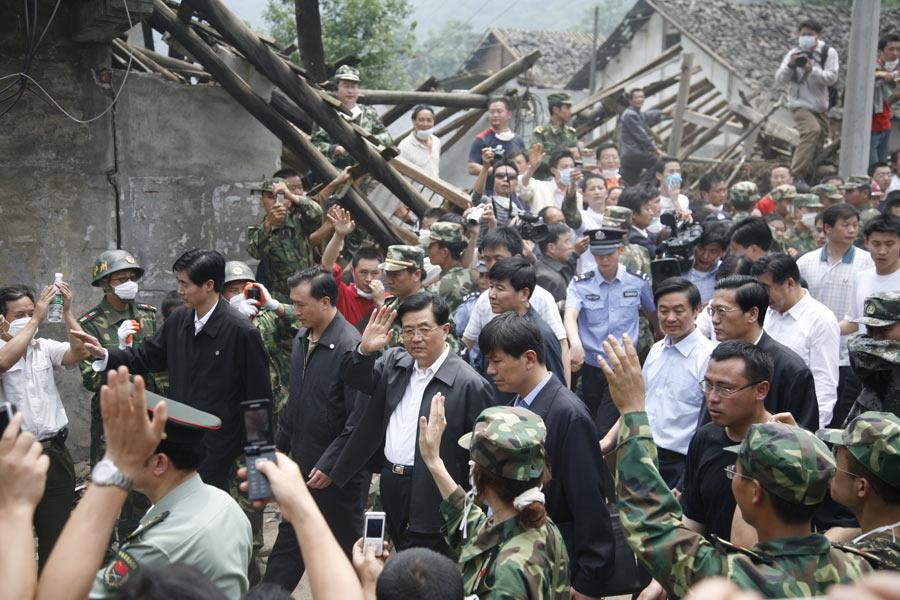 immediately arrived in the quake worst-hit areas to