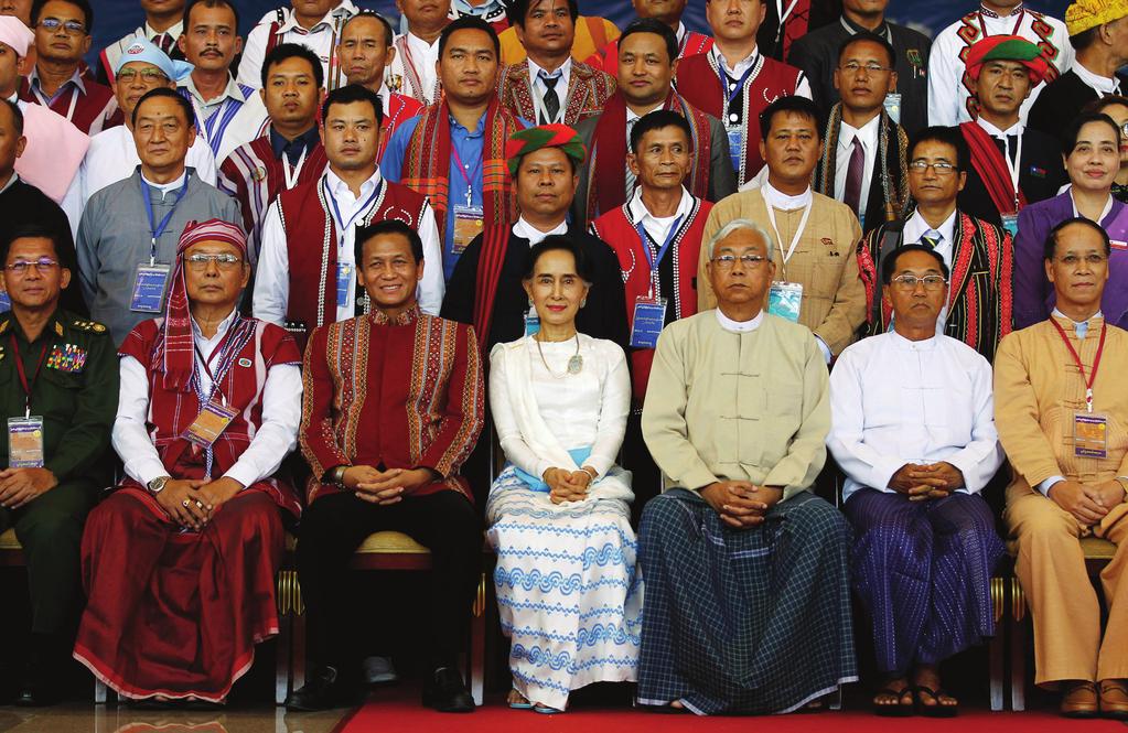The Myanmar military's commander-in-chief Senior General Min Aung Hlaing (front left), State Counselor Aung San Suu Kyi (front center), and government and ethnic leaders pose for a photo after the