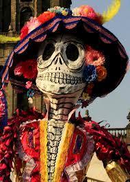 15. How is the Day of the Dead an example of blended culture? a. It is celebrated by traditional African cultures. b. A Roman Catholic holiday is given a new name in Mexico. c. The Roman Catholic holiday is celebrated in a way which includes Native American traditions.