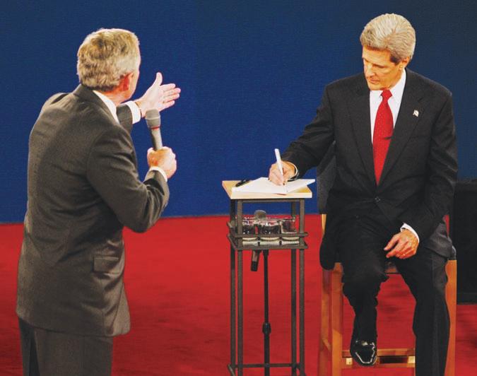 ELECTING THE PRESIDENT 79 President George W. Bush and Democratic challenger John Kerry debated in St. Louis in October 2004, a month before the election.