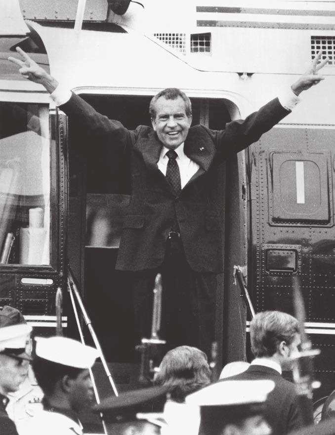88 THE PRESIDENCY Richard Nixon says goodbye to his staff members outside the White House as he boards a helicopter after resigning