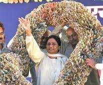 Conclusion: Manufacturing Charisma The role of Gender in Indian Politics Mayawati receiving a garland of