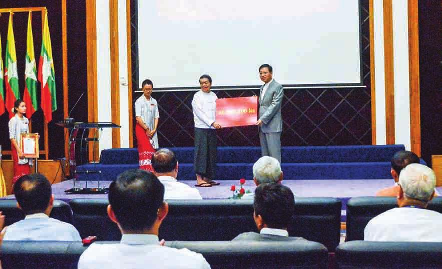 During the signing ceremony, Union Minister U Thant Sin Maung explained the Myanmar- Sat-2 and Regional Vice President (Asia Pacific) from Intelsat Global Sales and Marketing Ltd Officials pose a