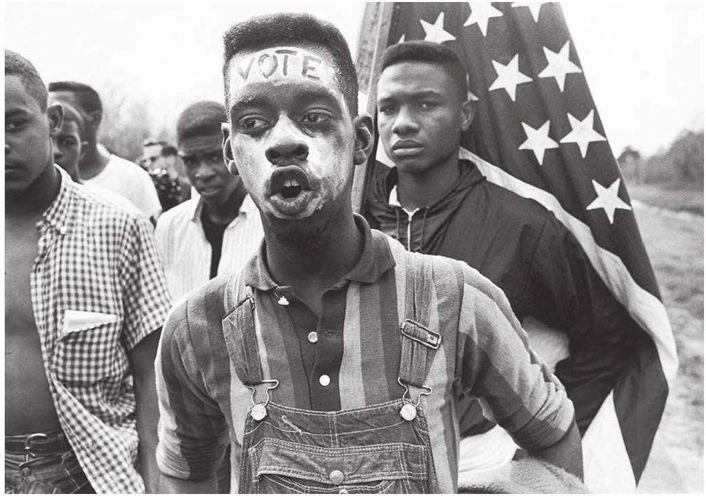 Questions 4-5 ref er to the photograph below. Source: Selma to Montgomery march, 1965, Bruce Davidson/Magnum Photo/Library of Congress 4.