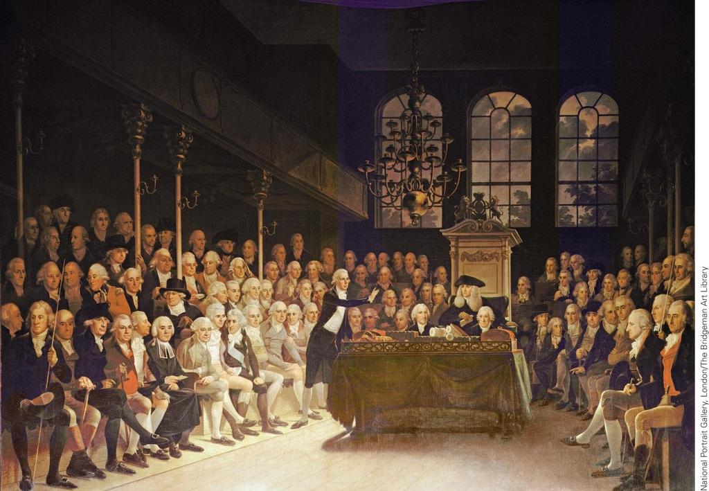 The English Constitutional Monarchy, 1660 1740 The Speaker of House of Commons sits with his hat on at the center behind secretaries.
