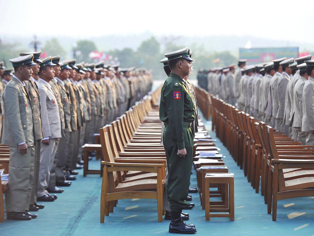 18 News THE MYANMAR TIMES OCTOBER 14-20, 2013 FEATURE A tactical retreat? Officers stand at attention during a ceremony to mark Armed Forces Day on March 27.
