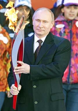 58 Sport THE MYANMAR TIMES OCTOBER 14-20, 2013 MOSCOW Russia to spy on Olympic athletes, visitors: researchers Russian President Vladimir Putin holds the Olympic flame in Moscow on October 5.