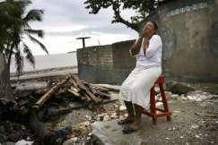 Slide 7 As shown, the number of people affected by natural disasters is on the increase. In this picture Bernadette Henri, 41, sits where her fish shop used to be in Haiti.