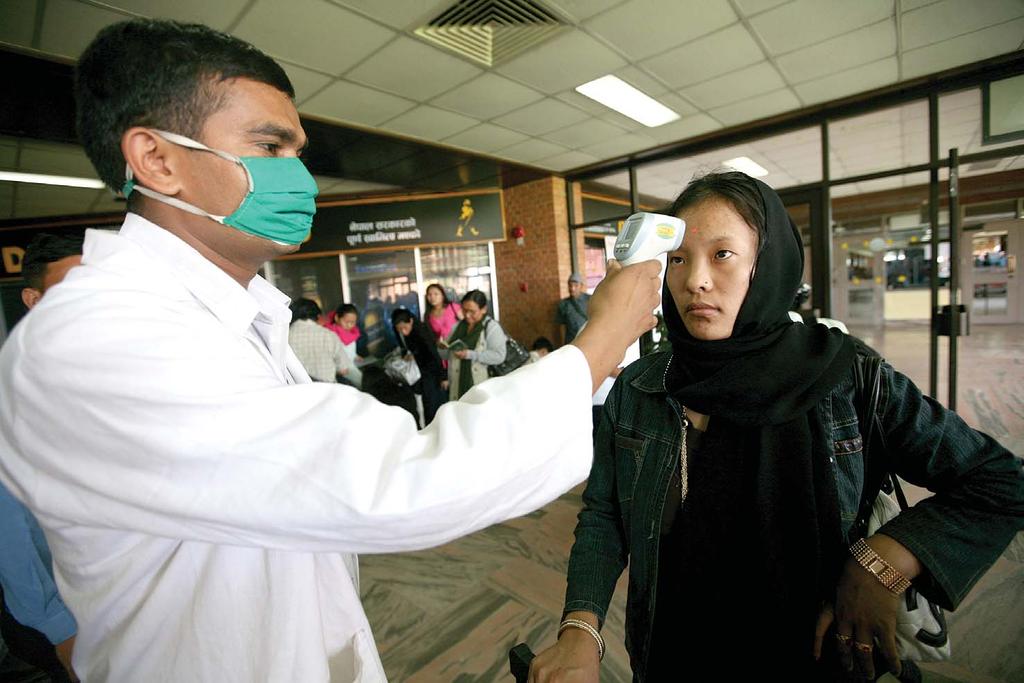 10 NATION 25 SEPTEMBER - 1 OCTOBER 2009 #470 WARM WELCOME: A TIA official goes through the motions DASAIN FEVERKIRAN PANDAY SUVAYU DEV PANT An outbreak of the H1N1 virus, or swine flu, could dampen
