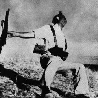 CIVIL WAR IN SPAIN SPANISH LOYALIST AT THE INSTANT OF DEATH by Robert Capra, 1936 In 1936, a group of Spanish army officers led by General Francisco