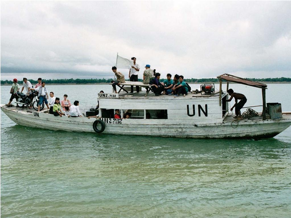 An UNTAC information education team heading towards a Cambodian