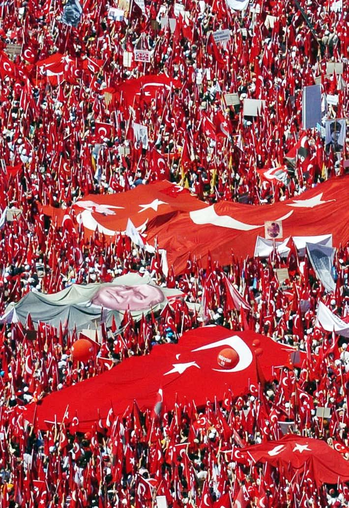 26 Thousands of secular Turks wave national flags as they fill the waterfront in the coastal city of Izmir as they gather to protest the Islamist-rooted government on May 13,