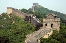 .. began construction on the Great Wall imposed standard weights and measures a