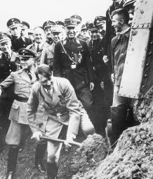 Adolph Hitler breaks ground on the Autobahn as part of his New Order plan to stimulate the German economy in 1933. ( Bettmann/Corbis. Reproduced by permission.) Great Depression.