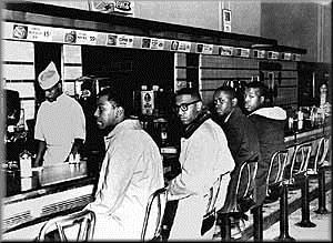 Greensboro Sit-ins February 1, 1960 Four black students sit at whites only lunch counter